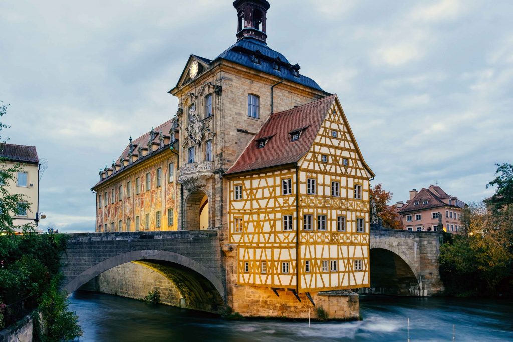 The Rathaus in Bamberg, Germany sits over the River Regnitz
